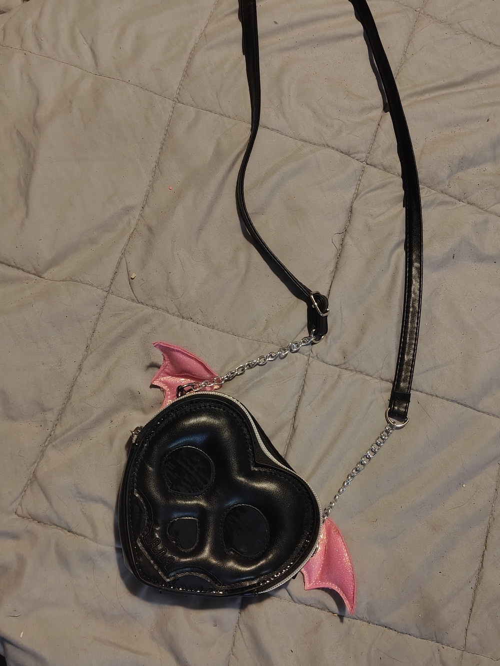 Cute Claires Black Heart Skull Crossbody Bag with Pink Wing Accents For Sale!